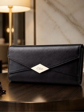 Stunning NWOT Chic Black Envelope Clutch wallet with Gold Accent